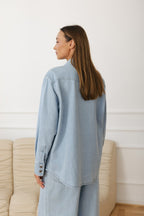 Women's denim shirt with chest pockets and snaps