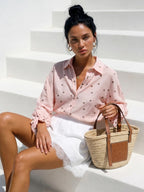 Women's polka dot shirt with a tied cuff