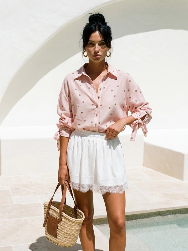 Women's polka dot shirt with a tied cuff