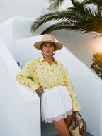 Women's polka dot shirt with a tied cuff