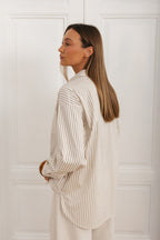 Women's vertical striped shirt with a chest pocket