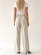 Damskie spodnie wide leg z kieszeniami – Ecru – tył