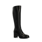Women's high boots with a wide heel and smooth shaft