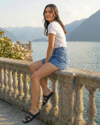 Women's denim skirt-shorts with a pleat and three silver snaps