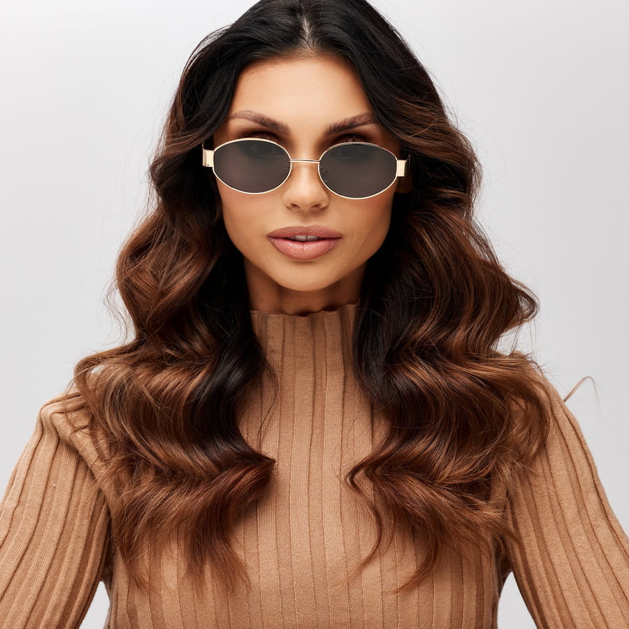 Women's sunglasses with a metal frame and oval lenses