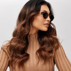 Women's sunglasses with a metal frame and oval lenses