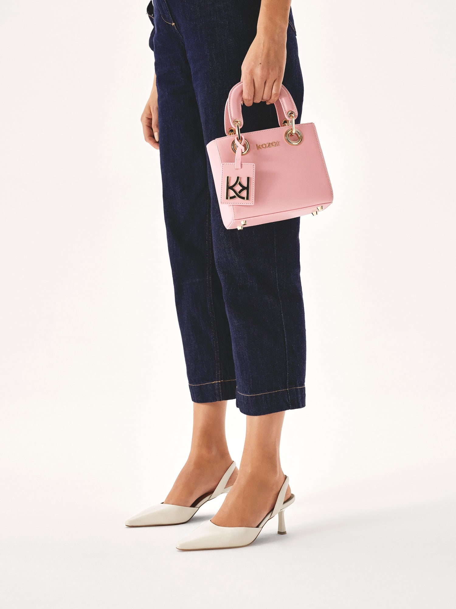 Women's high heels with an open heel, pointed toe, and side cutout