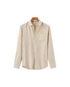 Men's shirt made of textured fabric with a chest pocket and long sleeves