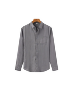 Men's shirt made of textured fabric with a chest pocket and long sleeves
