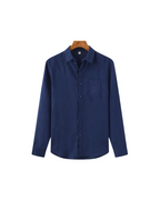 Men's shirt made of textured fabric with a chest pocket and long sleeves