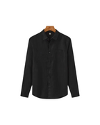 Men's shirt made of textured fabric with a chest pocket and long sleeves