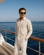 Men's shirt made of textured fabric with a chest pocket and long sleeves