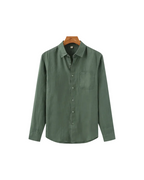 Men's shirt made of textured fabric with a chest pocket and long sleeves