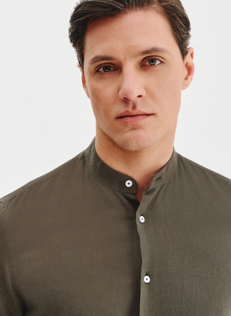 Men's shirt with a stand collar and long sleeves with buttons
