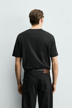Men's short-sleeve shirt with a shorter cut