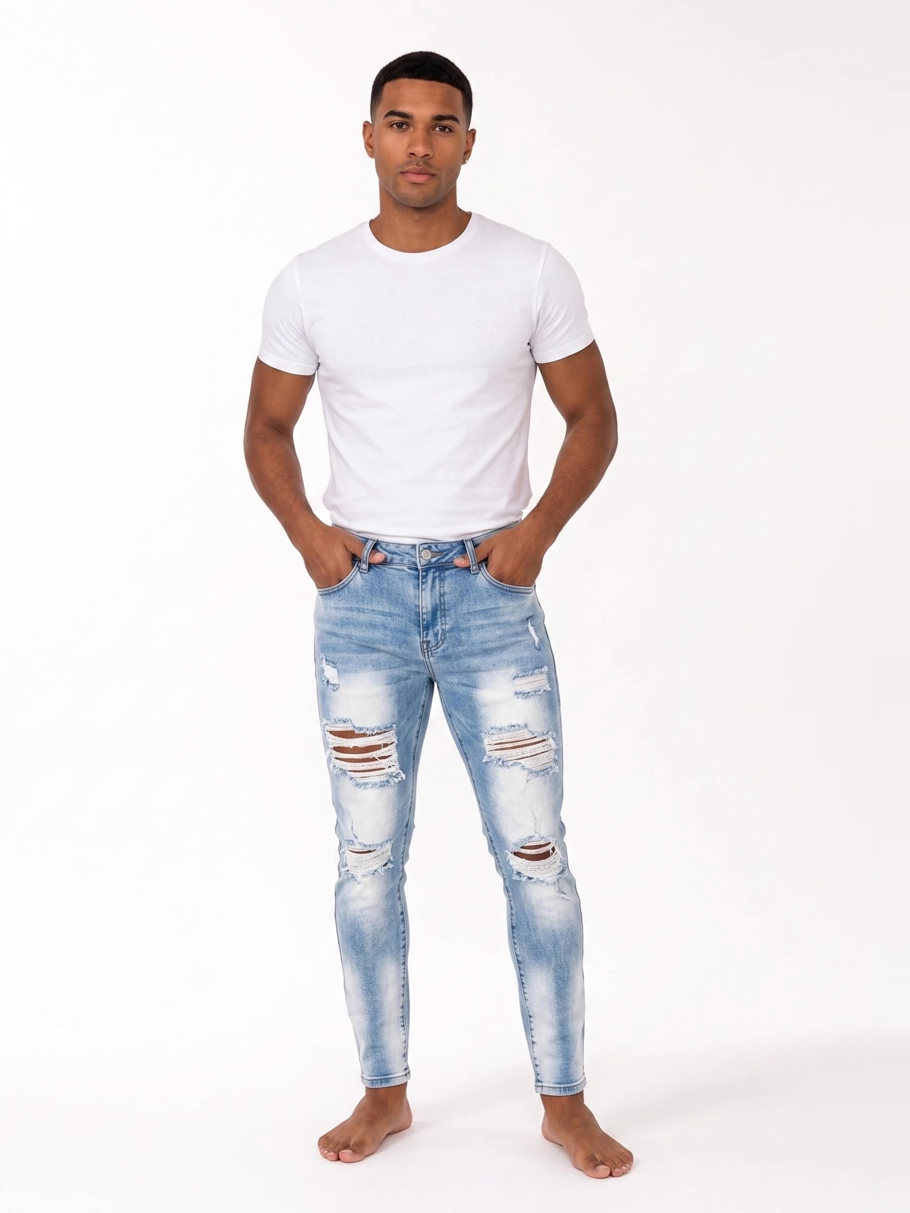 Męskie jeansy skinny z przetarciami – widok z przodu