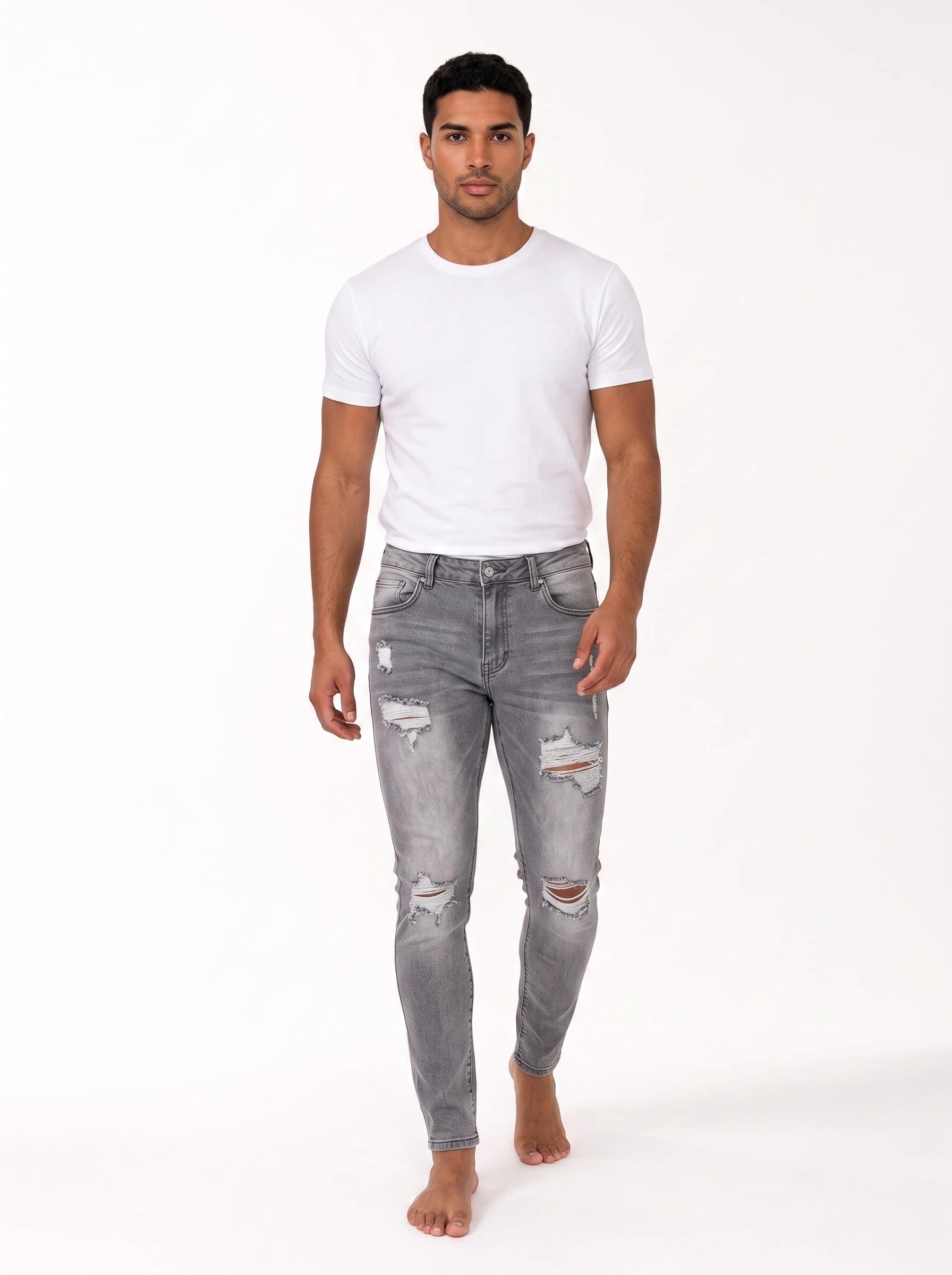 Męskie jeansy skinny z przetarciami – widok z przodu, drugi wariant