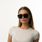 Unisex aviator sunglasses with wide black lenses