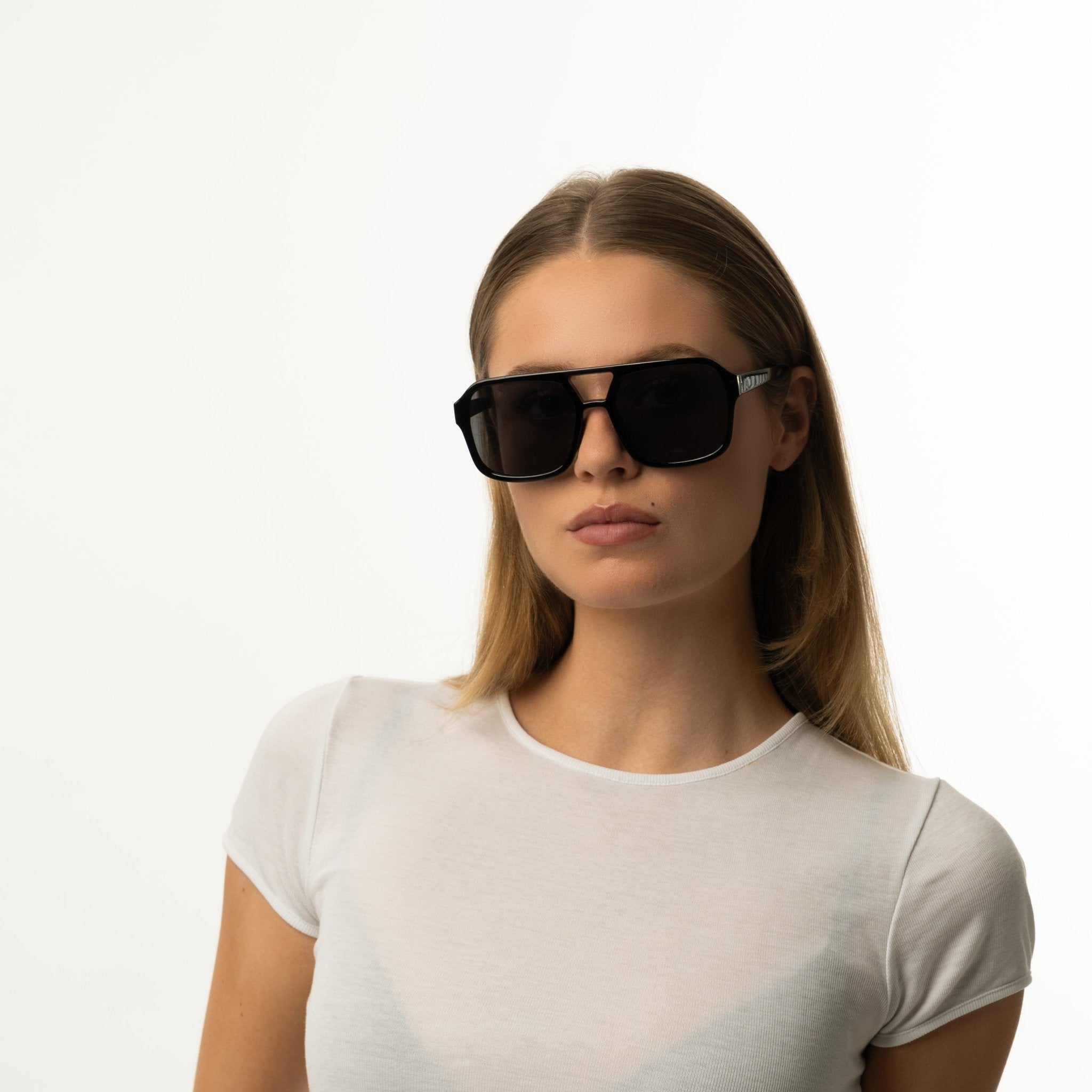 Unisex aviator sunglasses with wide black lenses