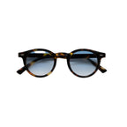 Unisex sunglasses with a round tortoiseshell-patterned frame and blue lenses