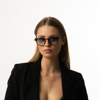 Unisex sunglasses with a round tortoiseshell-patterned frame and blue lenses
