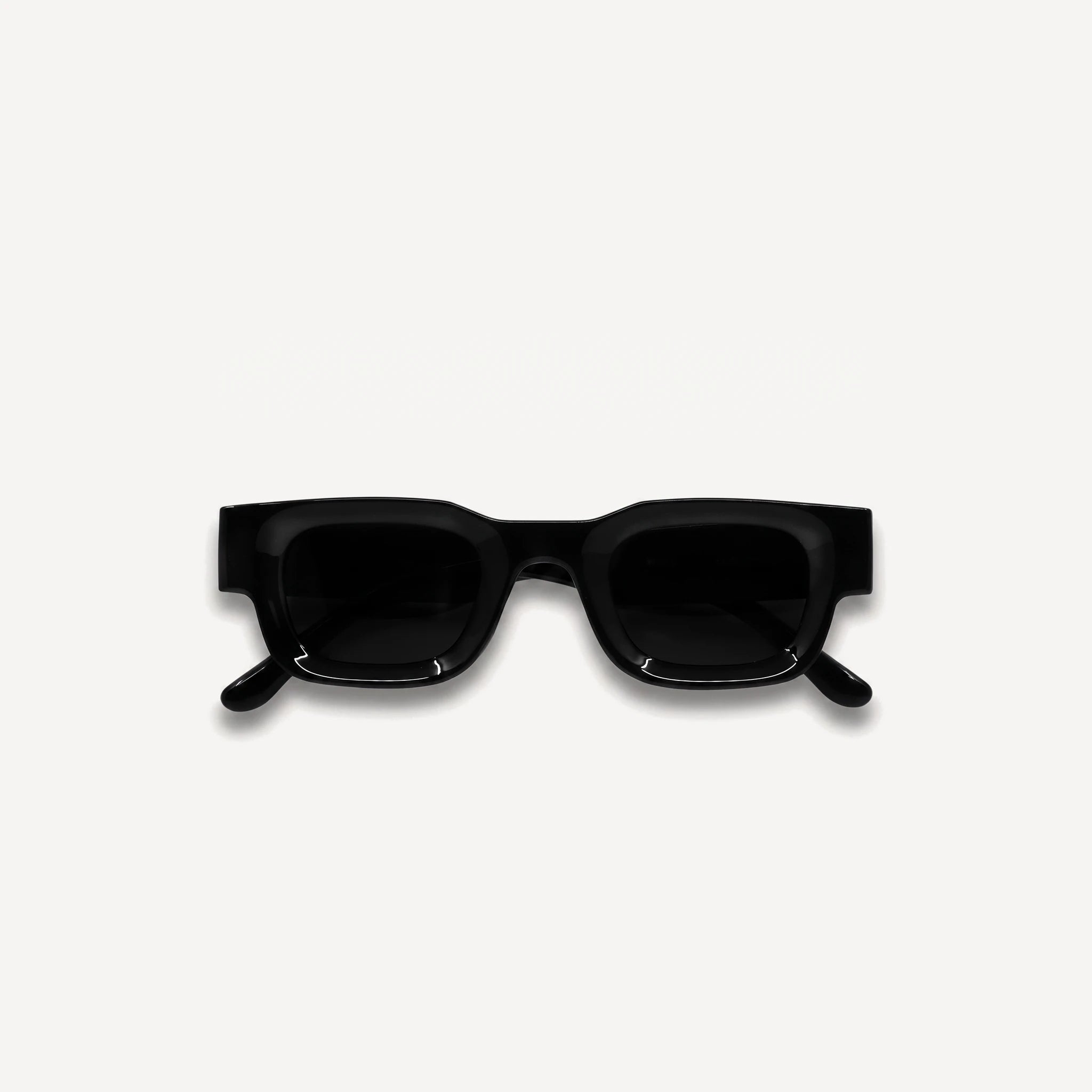 Okulary przeciwsłoneczne unisex z prostokątną oprawką i czarnymi szkłami